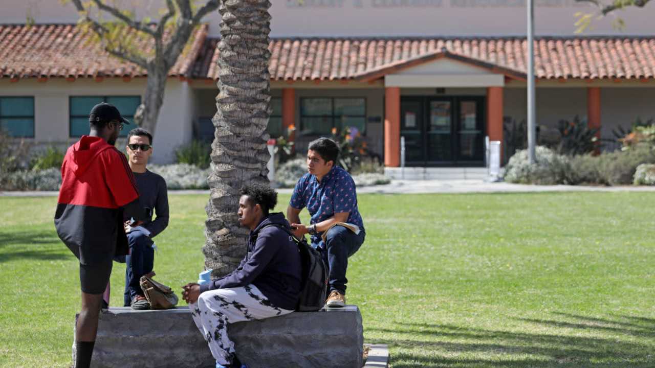 LONG BEACH, CA - MARCH 16: Students gather at Long Beach City College on Wednesday, March 16, 2022 in Long Beach, CA. Enrollment at California Community Colleges has plummeted nearly 20% during the pandemic to about 1.3 million students from fall 2019 to fall of 2021, according to state data. (Gary Coronado / Los Angeles Times via Getty Images)