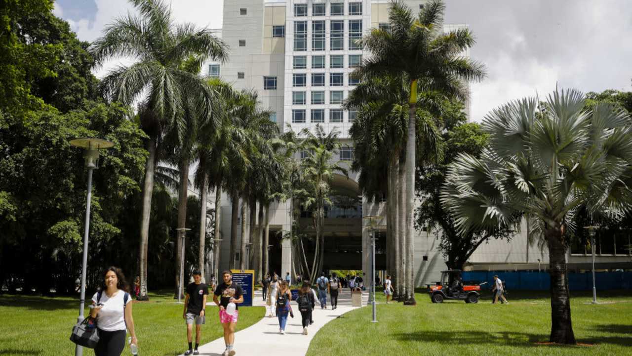 Students walking on campus at Florida International University (FIU) in Miami, Florida.
