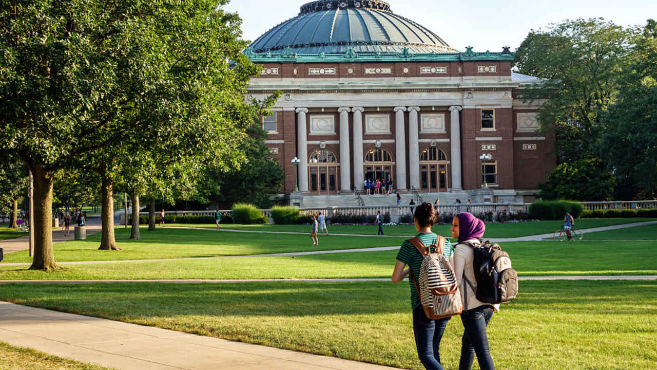 Muslim students wearing hijab scarf on campus of the University of Illinois. (Photo by: Jeffrey Greenberg/Universal Images Group via Getty Images)
