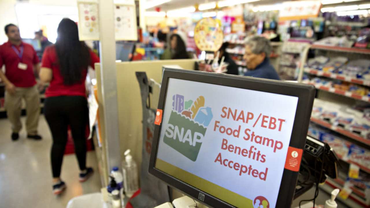 "SNAP/EBT Food Stamp Benefits Accepted" is displayed on a screen inside a Family Dollar Stores Inc. store in Chicago, Illinois, U.S., on Tuesday, March 3, 2020. Dollar Tree Inc. released earnings figures on March 4. Photographer: Daniel Acker/Bloomberg via Getty Images