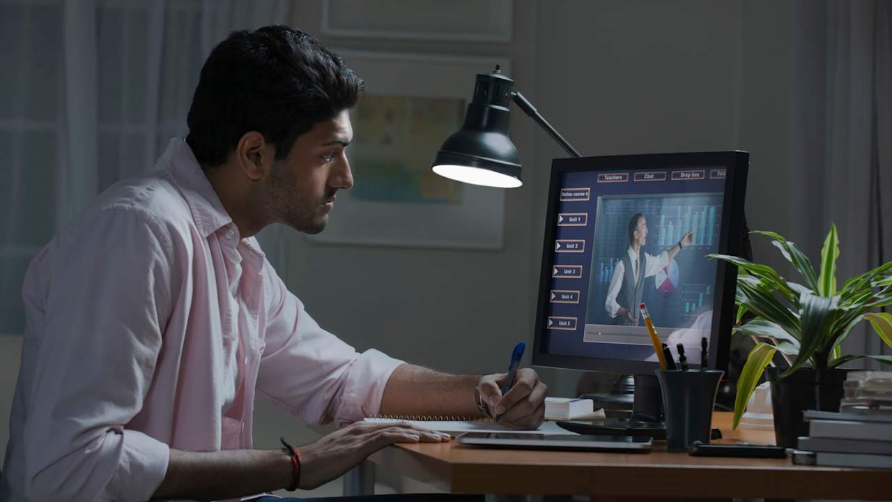 Businessman working at desk at home