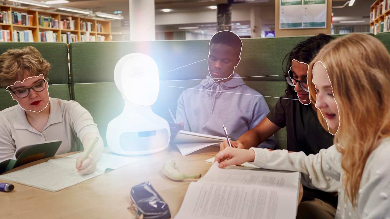 Students studying in library with robotic voice assistant