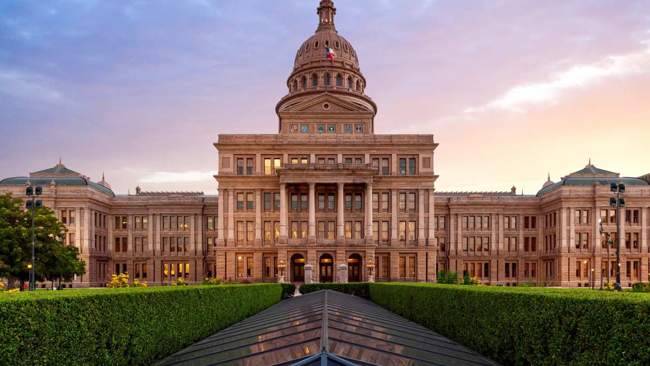 Sunset over the Texas Capitol building in Austin, Texas.