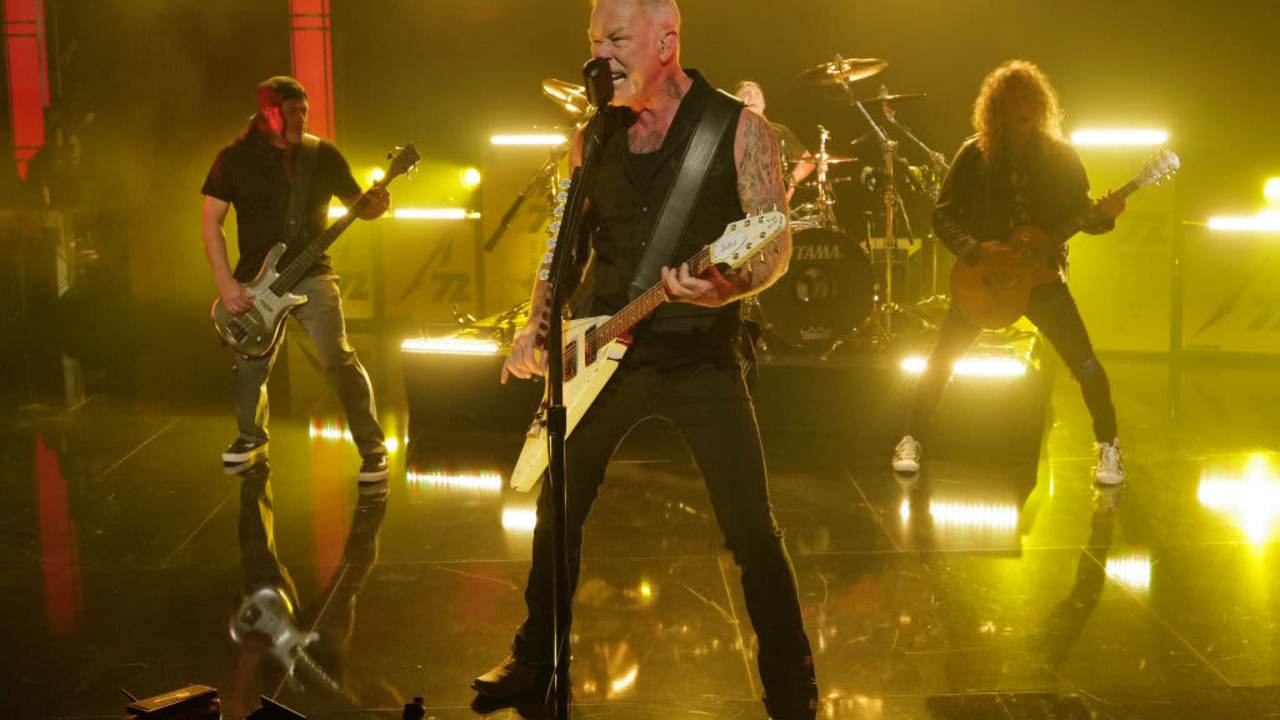 Metallica playing on stage at the "Jimmy Kimmel Live!" show.