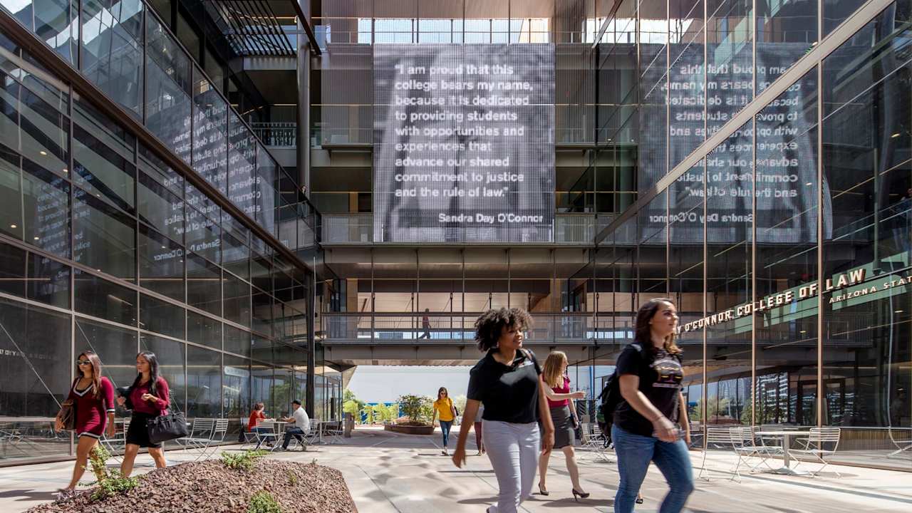 Students walk through the courtyard of the Sandra Day O'Connor College of Law on the Arizona State University campus in downtown Phoenix.