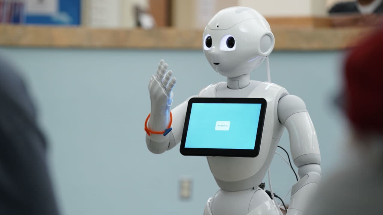 Robotic assistant with screen in nursing home
