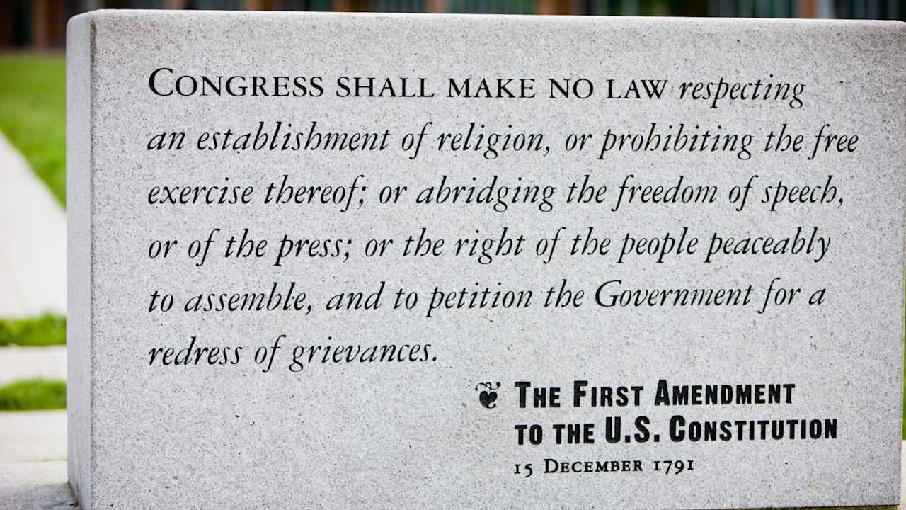 The first amendment of the US Constitution engraved on a stone
