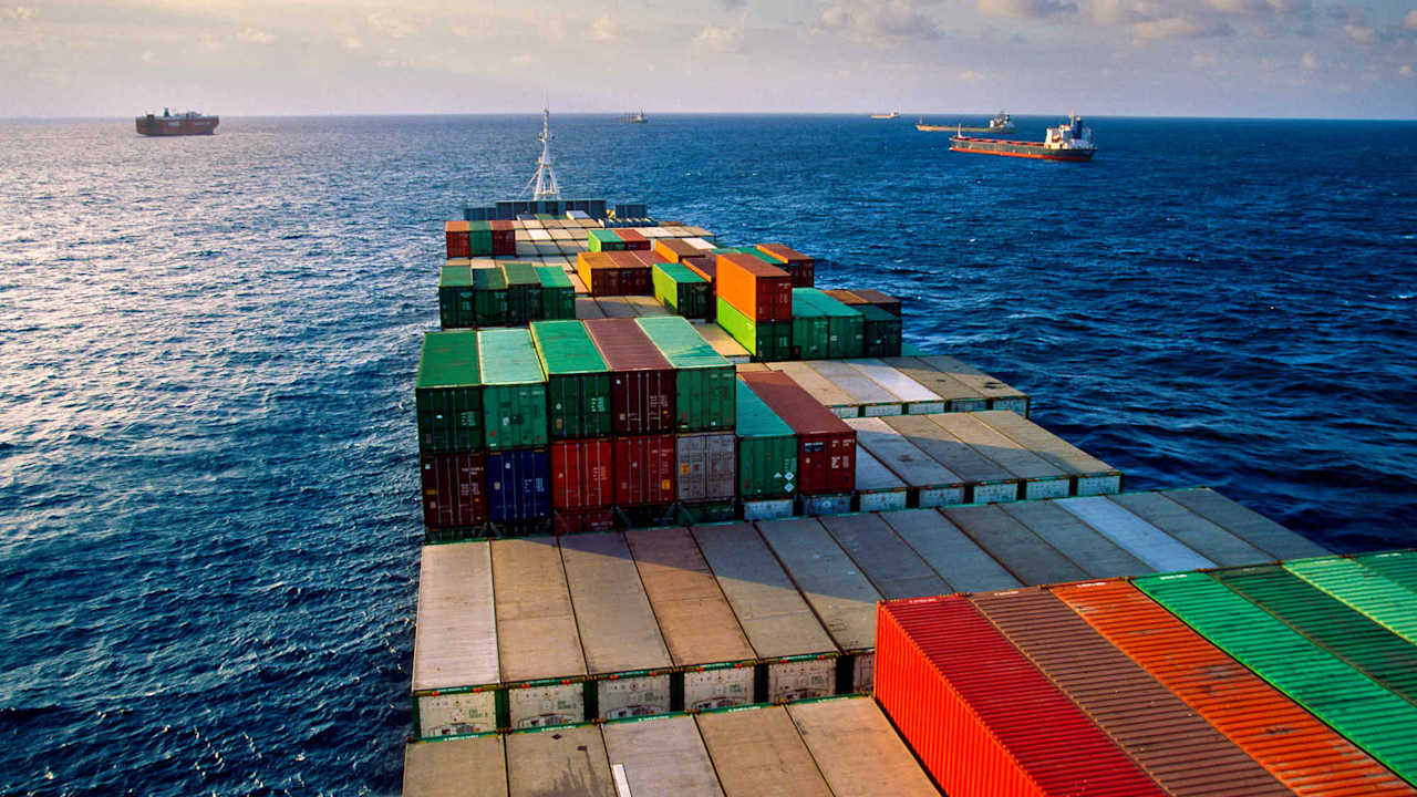 The container vessel Panamax transporting cargo across the open sea near Colon en route to the Panama Canal.