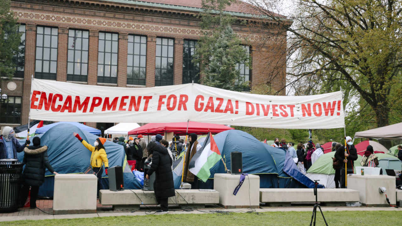 University students protest against Israeli attacks on Gaza as they set up an encampment on the University of Michigan campus quad in Ann Arbor on April 24, 2024.