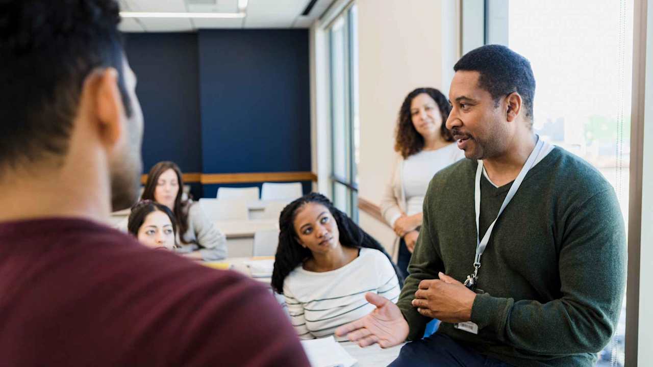 Business professor addresses the class