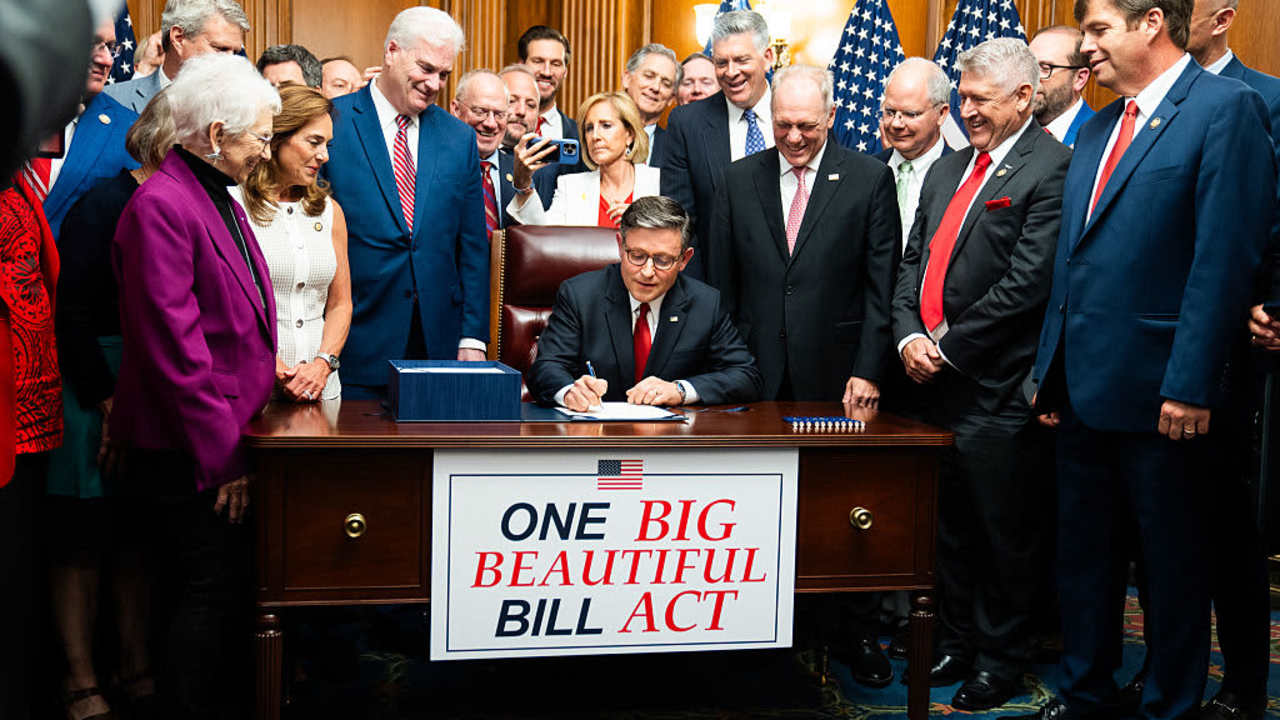 House Speaker Mike Johnson (R-LA) signs the "Big Beautiful Bill Act" on Capitol Hill on Thursday July 3, 2025