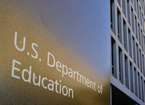 A sign marks the location of the U.S. Department of Education headquarters building