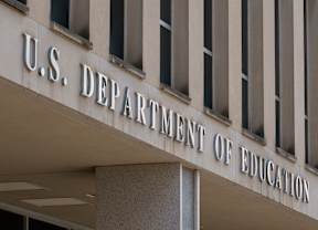 WASHINGTON, DC - MAY 18: A sign is displayed outside of the Lyndon Baines Johnson Department of Education building on May 18, 2025 in Washington, DC. (Photo by Kevin Carter/Getty Images)