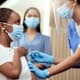 Cropped shot of a young businesswoman getting her covid vaccination from a female nurse in the office