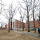 Students walk along the campus of Amherst College in Amherst, MA.