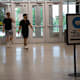 College students enter the student center during move-in day at Oakland University in Rochester, Michigan, U.S., on Friday, Aug. 27, 2021. Oakland University announced Monday that it will require all students, faculty and staff on campus to get a Covid-19 vaccine, expanding its previous policy that only required students living in dormitories to be vaccinated, according to The Detroit News.