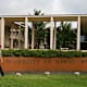 A student walks on campus at the University of Hawaii in Honolulu, Hawaii, U.S., on Wednesday, Jan. 9, 2013. Honolulu, the southernmost major U.S. city, is a major financial center of the islands of the Pacific Ocean.