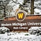 A picture of the front sign at Western Michigan University outside in the snow. The sign reads: Western Michigan University Main Campus.