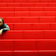Bored student sitting in university lecture hall.