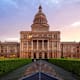 Sunset over the Texas Capitol building in Austin, Texas.