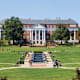 Student walking in McKeldin Mall quadrangle in the heart of the University of Maryland campus in College Park, Maryland.