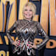 US singer and songwriter Dolly Parton arrives at the 57th Academy of Country Music awards at Allegiant Stadium in Las Vegas, Nevada, on March 7, 2022.