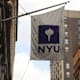 NYU flag hanging outside building