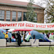 University students protest against Israeli attacks on Gaza as they set up an encampment on the University of Michigan campus quad in Ann Arbor on April 24, 2024.