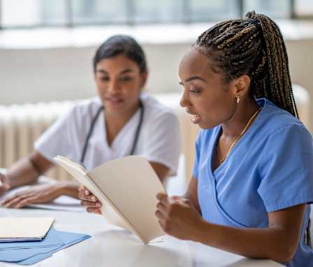 Two nursing students studying together