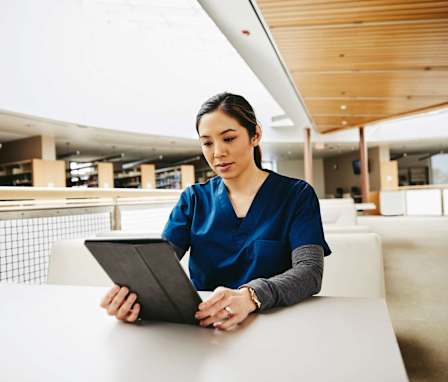 Medical student in library