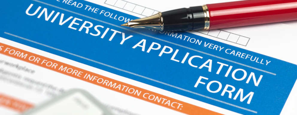 Filling out a college application form.
