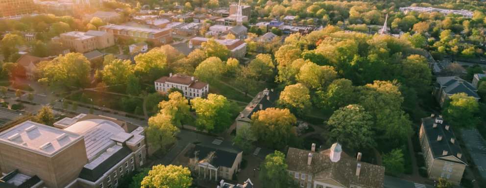 A bird's eye view of the University of North Carolina Chapel Hill campus at sunrise.