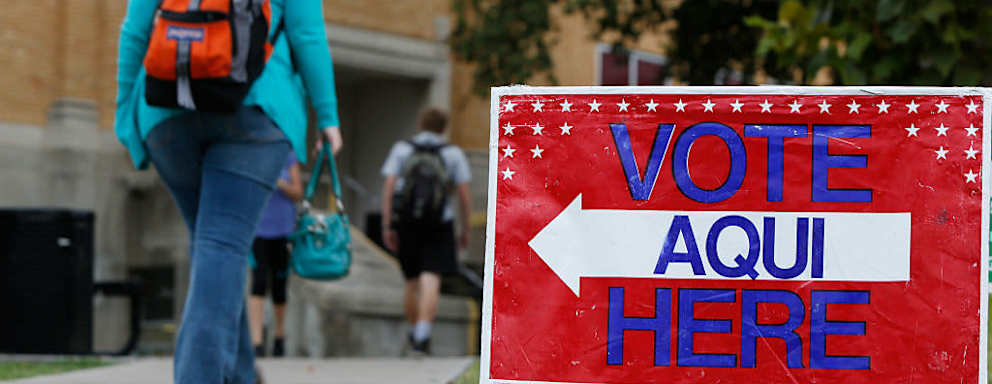 AUSTIN, TX - NOVEMBER 4: A sign shows the way to the polling station at Austin Community College on November 4, 2014 in Austin, Texas. Voters headed to the polls today to decide a number of tight races. (Photo by Erich Schlegel/Getty Images)