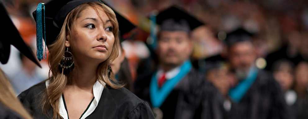 Community college graduation ceremonies for associates degrees at El Paso Community College in El Paso, Texas. (Photo by Robert Daemmrich Photography Inc/Corbis via Getty Images)