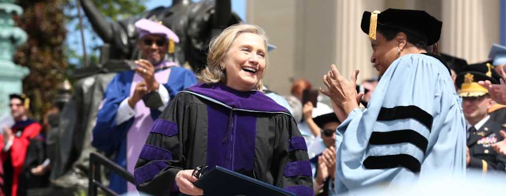 Photo of Hillary Clinton receiving accolades at Columbia University's Graduation commencement in May, 2022.