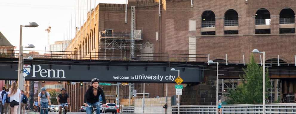 Cyclists commuting on city streets bike lanes with cars and traffic, University City, Philadelphia, Pennsylvania, USA. (Photo by: Jumping Rocks/UCG/Universal Images Group via Getty Images)