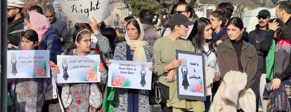 People demonstrate in front of the White House in Washington, DC, on January 1, 2023 against the Afghan Taliban regime's ban of higher education for womwn. - The UN Security Council on December 27, 2022 called on the Taliban to reverse policies targeting women and girls in Afghanistan, expressing alarm at the "increasing erosion" of human rights in the country. (Photo by Daniel SLIM / AFP) (Photo by DANIEL SLIM/AFP via Getty Images)