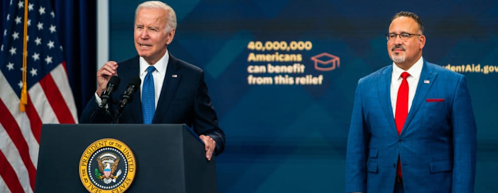 WASHINGTON, DC October 17, 2022: US President Joe Biden delivers an update on the Student Debt Relief Portal Beta Test in the South Court Auditorium of Eisenhower Executive Office Building on Monday, October 17, 2022. United States Secretary of Education Miguel Cardona was in attendance. (Photo by Demetrius Freeman/The Washington Post via Getty Images)