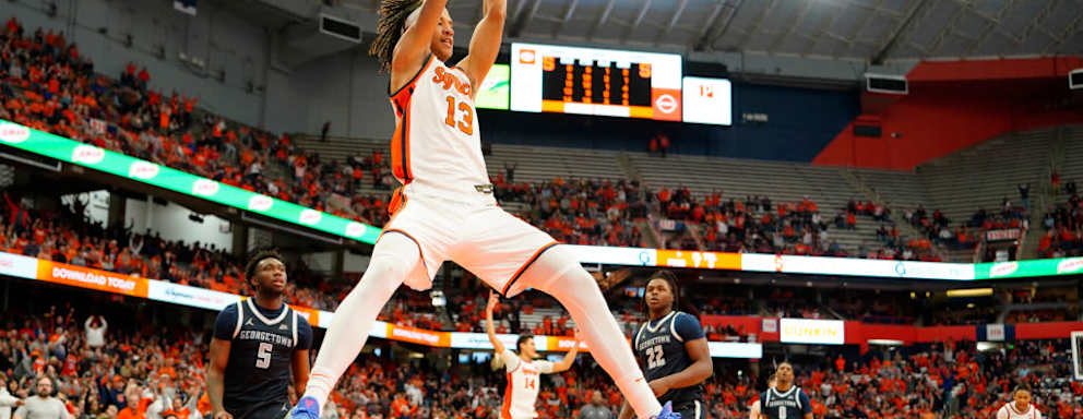 SYRACUSE, NY - DECEMBER 10: Syracuse Orange Forward Benny Williams (13) dunks the ball during the second half of the college basketball game between the Georgetown Hoyas and the Syracuse Orange on December 10, 2022, at the JMA Wireless Dome in Syracuse, NY. (Photo by Gregory Fisher/Icon Sportswire via Getty Images)