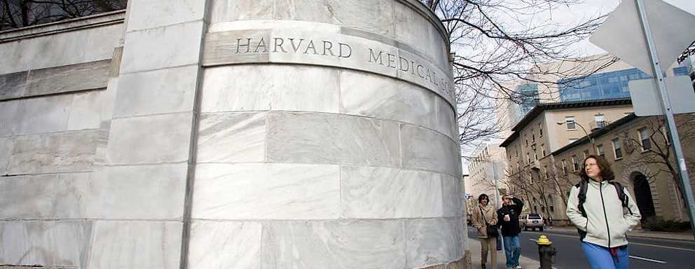 UNITED STATES - MARCH 30: Pedestrians pass the entrance to The Harvard Medical School on Longwood Avenue in Boston, Massachusetts, Friday March 30, 2007. Harvard University operates the best U.S. programs in business and medical research and surrendered the top title in education to Teachers College at Columbia University, according to an annual ranking of graduate schools. (Photo by Michael Fein/Bloomberg via Getty Images)