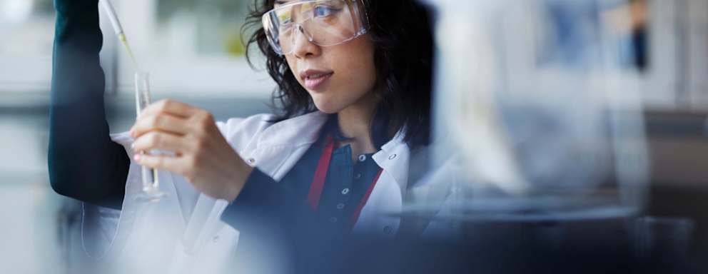 Young female scientist working in laboratory