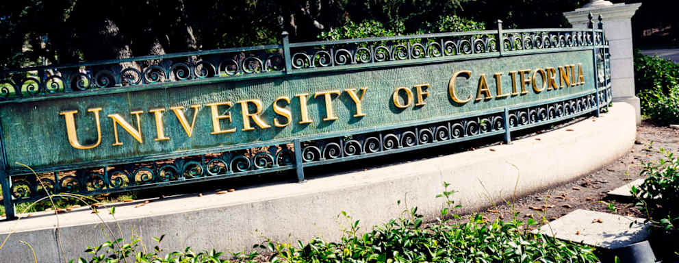 Berkeley, California, USA - October 15, 2016: University of California entrance sign on the corner of Oxford Street and Center Street at Berkeley, California. Over 150 years old, and with many Nobel Prizes winners (they even have reserved parking spots for them), the campus serves almost 40,000 students within an open green space.