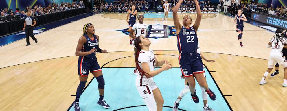 Evina Westbrook of the UConn Huskies scoring a shot against the South Carolina Gamecocks during the NCAA Women's Basketball championship game on April 3, 2022.