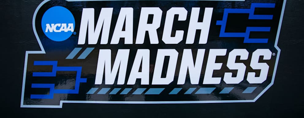 A photo of the NCAA March Madness logo during the men's college basketball game between the Loyola Chicago Ramblers and the Ohio State Buckeyes at PPG Paints Arena in Pittsburgh, PA.