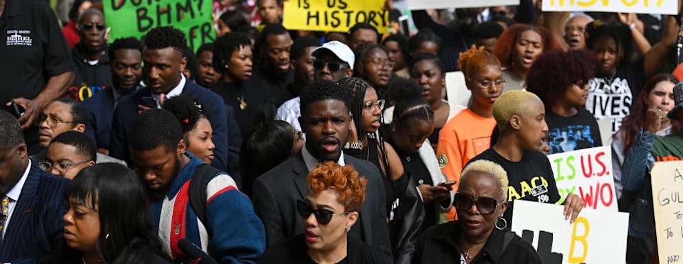 TALLAHASSEE, FL - FEBRUARY 15: Demonstrators protest Florida Governor Ron DeSantis plan to eliminate Advanced Placement courses on African American studies in high schools as they stand outside the Florida State Capitol on February 15, 2023 in Tallahassee, Florida. DeSantis says Advanced Placement courses on African American studies violates the Stop WOKE Act, which curbs race-related and gender curriculum from Florida classrooms. (Photo by Joshua Lott/The Washington Post via Getty Images)