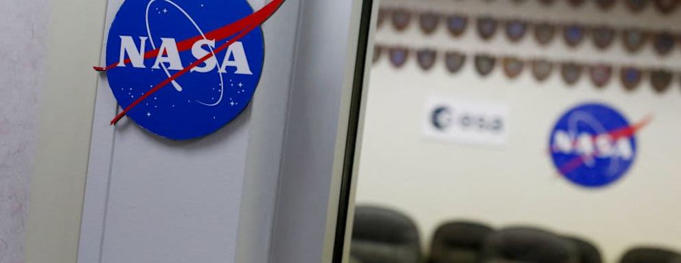 NASA logos are seen in the conference room of the Astronaut Crew Quarters (ACQ) at Kennedy Space Center, in Cape Canaveral, Florida, on June 14, 2022. - NASA's Kennedy Space Center in Florida has played a leading role in the American space program for 60 years. The Launch Operations Center was first established in July 1962, and renamed the John F. Kennedy Space Center in December 1963. (Photo by Eva Marie UZCATEGUI / AFP) (Photo by EVA MARIE UZCATEGUI/AFP via Getty Images)