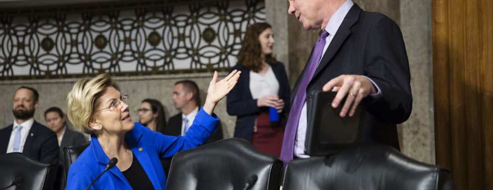 Senator Elizabeth Warren, a Democrat from Massachusetts, left, speaks with Senator Tim Kaine, a Democrat from Virginia, while arriving for a Senate Armed Services Committee confirmation hearing for Mark Esper, secretary of defense nominee for U.S. President Donald Trump, not pictured, on Capitol Hill in Washington, D.C., U.S., on Tuesday, July 16, 2019. Esper's confirmation as secretary of defense is a matter of urgency after almost seven months with an acting leader at the Pentagon, the top Republican and Democrat on the Senate Armed Services Committee said at the hearing. Photographer: Sarah Silbiger/Bloomberg via Getty Images