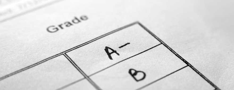 Macro shot of A- on white results sheet. Extremely shallow focus.