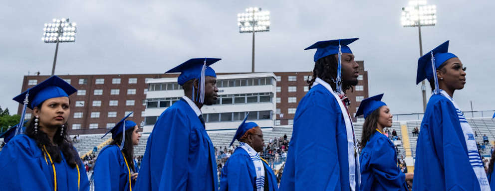 Graduating students of Tennessee State University make their way to their seats before graduating in Nashville, Tennessee, on May 7, 2022. (Photo by SETH HERALD / AFP) (Photo by SETH HERALD/AFP via Getty Images)