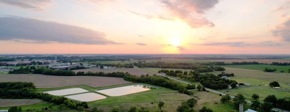 Scenic view of landscape against sky during sunset, Yoder, Kansas, United States, USA